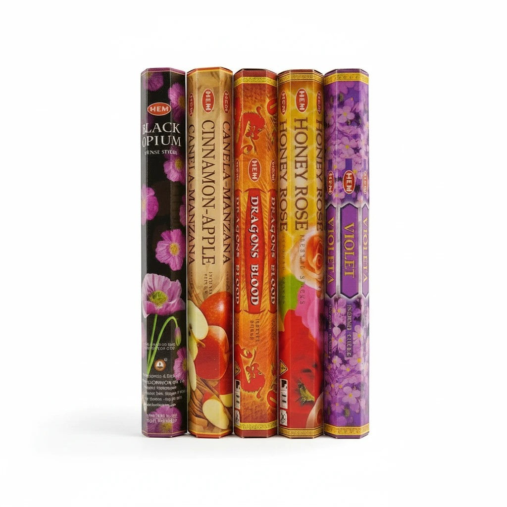 The Witches' Quest HEM incense variety pack featuring five hexagonal boxes of assorted floral and spice scents.