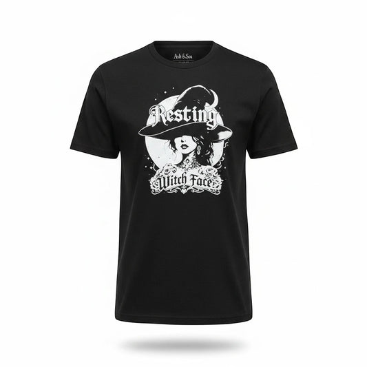The Witches' Quest black unisex cotton t-shirt featuring a white distressed Resting Witch Face moon graphic.