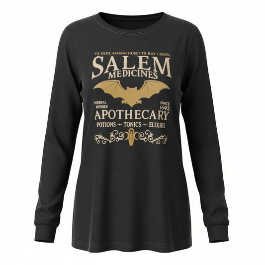 The Witches' Quest black long sleeve shirt featuring a gothic Salem apothecary graphic with a bat and vintage text.