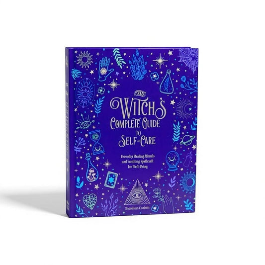 The Witches' Quest hardcover book The Witch's Complete Guide to Self-Care with blue cover and mystical illustrations.