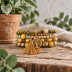 Boho tree of life beaded bracelet set with earth tone beads and a gold tassel charm