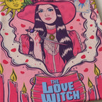 Love Witch tote bag featuring a woman in a pink hat holding a dagger over a steaming cauldron with candles