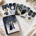 Seasons of the Witch Winter Tarot Deck box and five illustrated cards on a marble surface