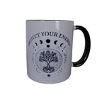 Protect Your Energy mug with black handle featuring moon phases and tree of life design