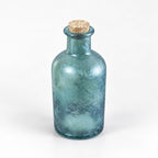 Six inch blue glass apothecary bottle with a cork stopper