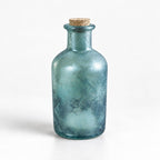 Blue textured glass apothecary bottle with cork stopper