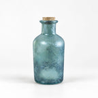Blue glass apothecary bottle with cork stopper