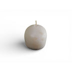 White skull shaped candle with a glittered finish