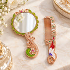 Butterfly and floral hand mirror and comb set in rose gold tone with enamel and crystal accents