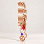 Rose gold tone butterfly and floral hair comb with enamel and gemstone accents
