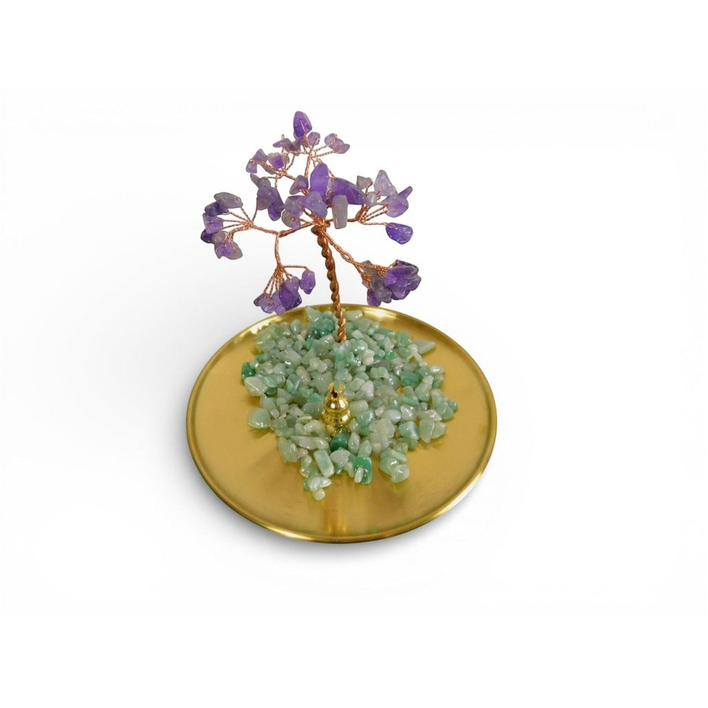 The Witches' Quest amethyst gemstone tree ornament with green aventurine chips on a polished gold-toned metal tray.