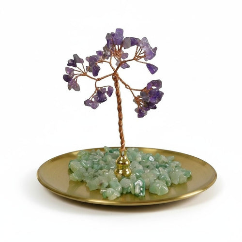 The Witches' Quest amethyst gemstone tree with wire branches on a gold tray with green aventurine crystal chips.