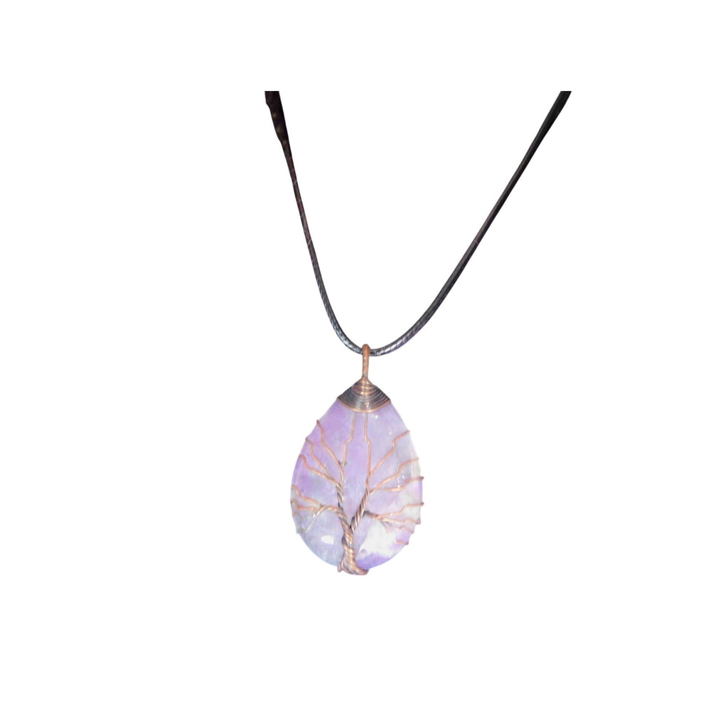 The Witches' Quest amethyst teardrop pendant with copper wire wrapped tree of life design on a black cord necklace.