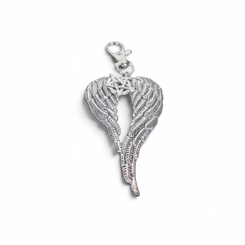 The Witches' Quest silver-toned angel wing keychain featuring a pentagram charm and a secure metal clip.