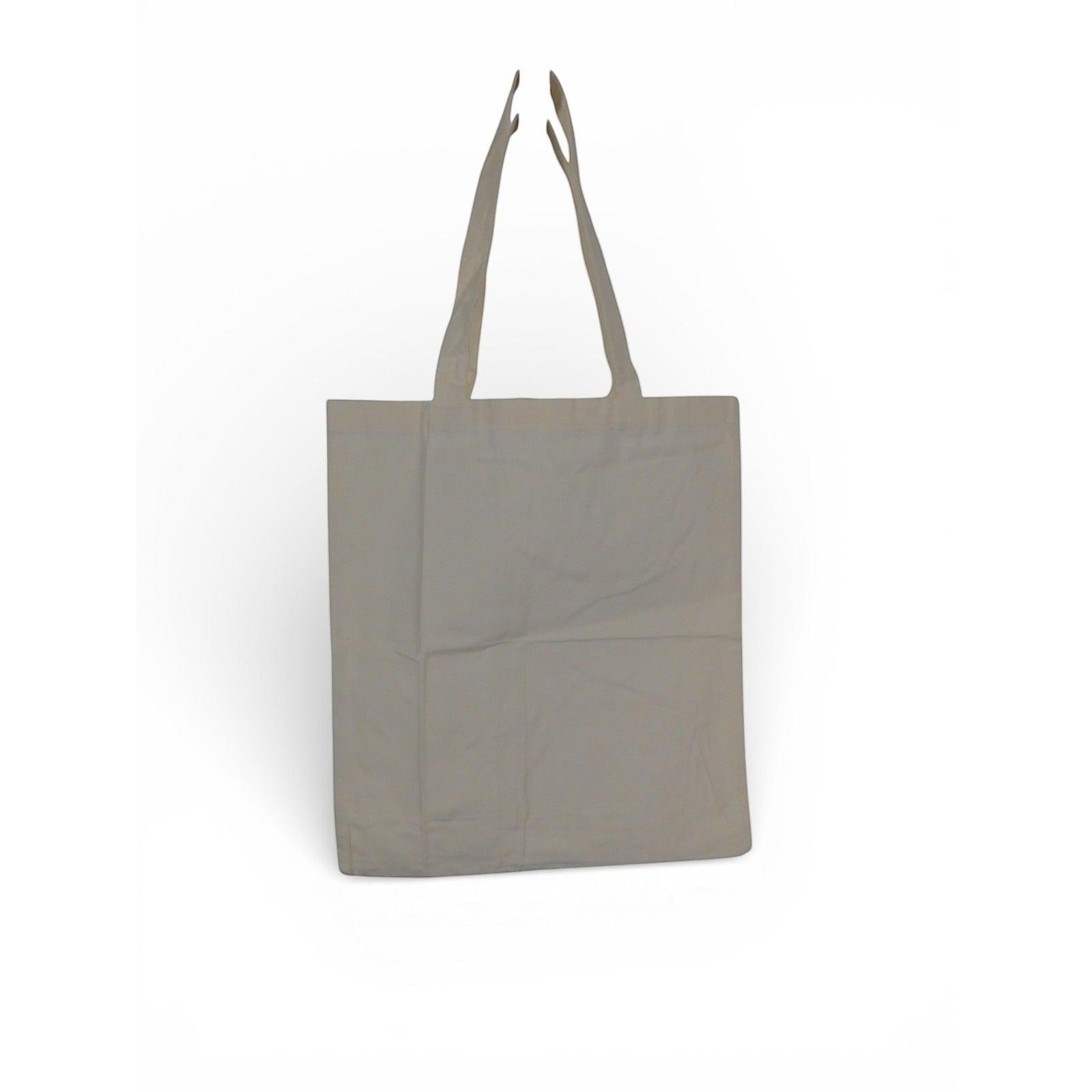 The Witches' Quest large beige canvas tote bag with long shoulder straps, shown from the plain back side.