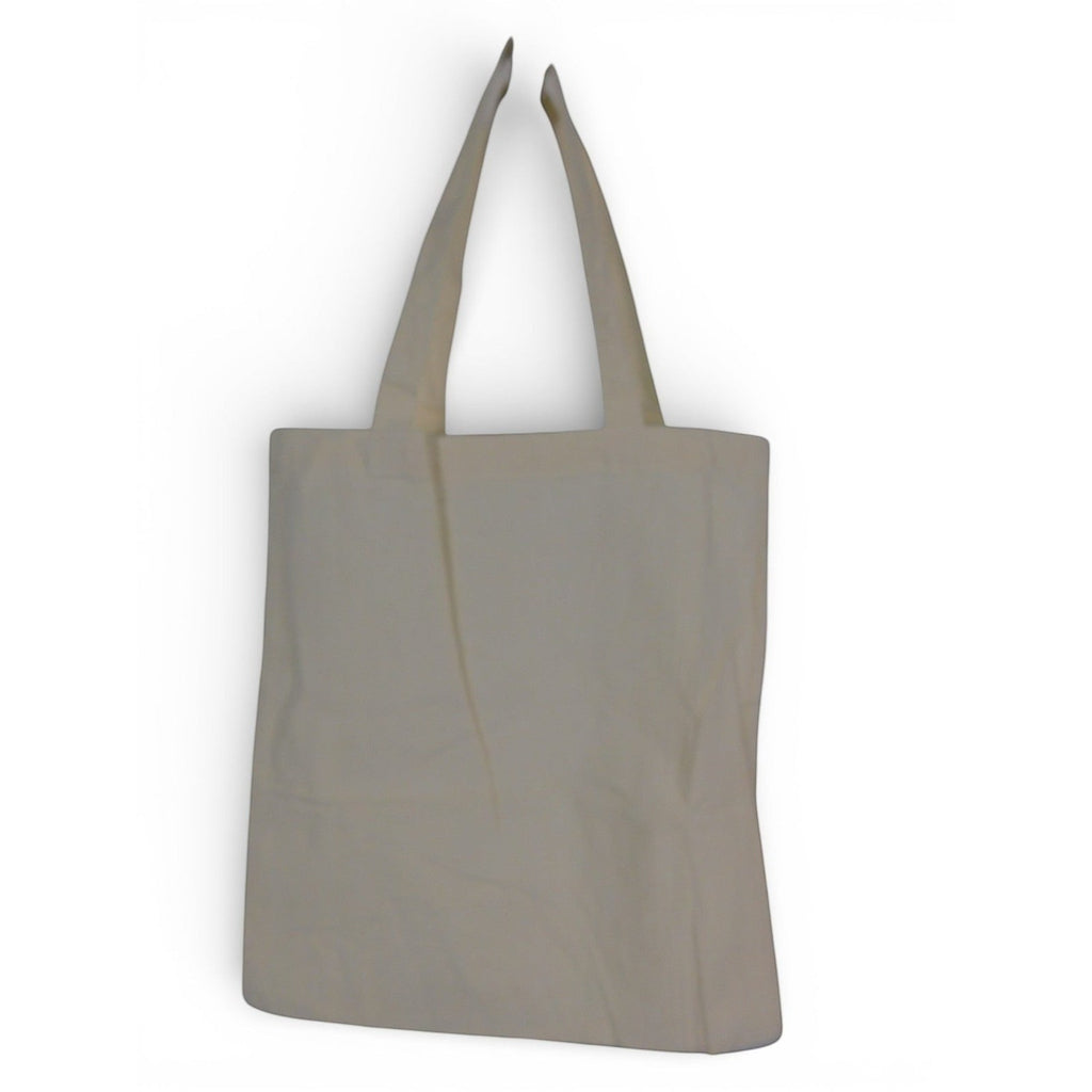 The Witches' Quest beige canvas tote bag with dual shoulder straps, shown from the plain back side.