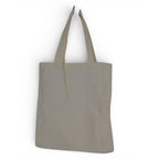 The Witches' Quest beige canvas tote bag with dual shoulder straps, shown from the plain back side.