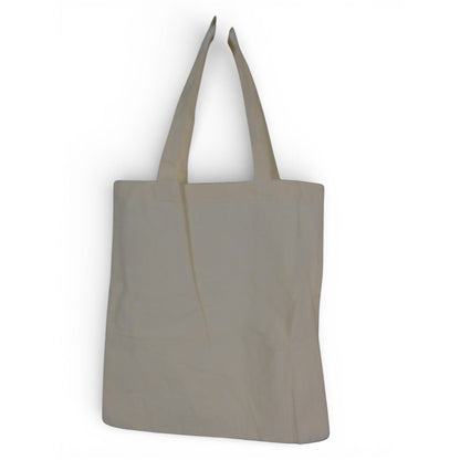 The Witches' Quest beige canvas tote bag with dual shoulder straps, shown from the plain back side.