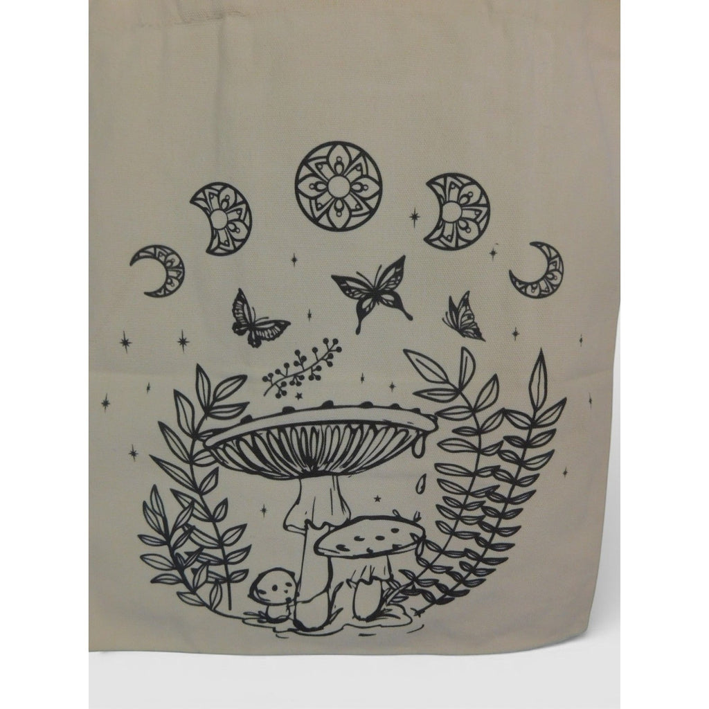 The Witches' Quest beige canvas tote bag featuring black line-art of mushrooms, butterflies, and celestial moon motifs.