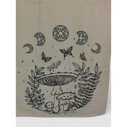 The Witches' Quest beige canvas tote bag featuring black line-art of mushrooms, butterflies, and celestial moon motifs.