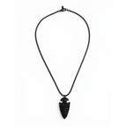 The Witches' Quest black arrowhead pendant necklace with engraved compass symbol on a textured chain