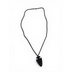 The Witches' Quest black arrowhead pendant necklace with engraved Viking compass symbol on a textured chain.