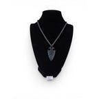 The Witches' Quest black arrowhead pendant necklace with engraved Viking compass symbol on a textured metal chain