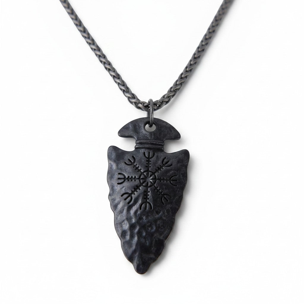 The Witches' Quest black arrowhead pendant necklace with engraved Viking compass symbol and textured metal finish