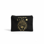 The Witches' Quest black canvas zipper pouch featuring a gold mystical chiromancy hand design on a white background.