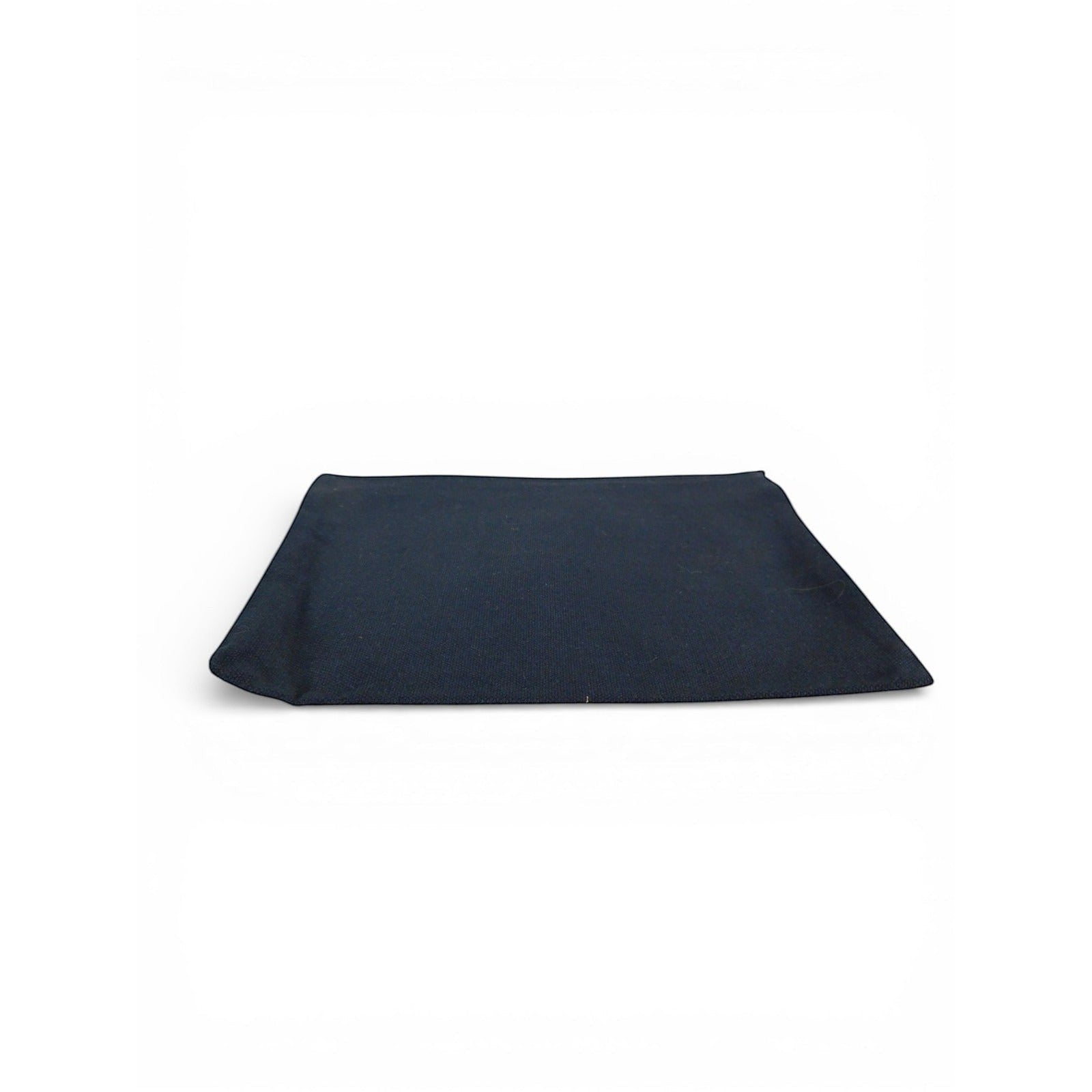 The Witches' Quest black canvas clutch bag showing the plain solid back side on a white background.