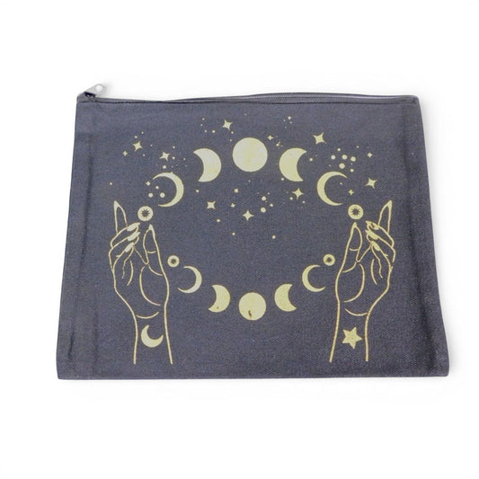 The Witches' Quest black canvas zipper pouch with gold celestial moon phase and hand illustration