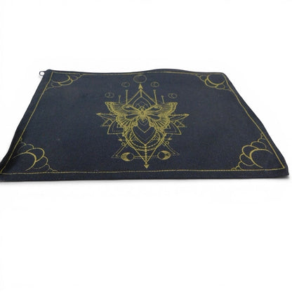 The Witches' Quest black canvas zipper pouch featuring an intricate gold moth illustration and geometric border.