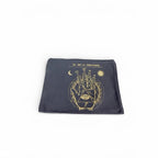 The Witches' Quest black canvas zip pouch featuring a gold Art of Chiromancy palmistry and celestial graphic print.