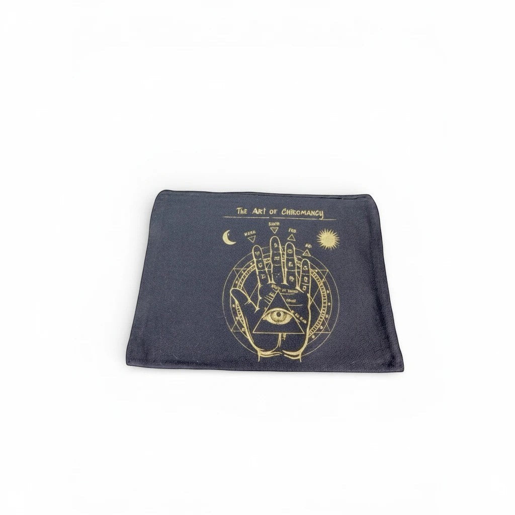The Witches' Quest black canvas zip pouch featuring a gold Art of Chiromancy palmistry and celestial graphic print.