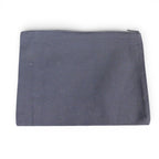 The Witches' Quest black canvas zipper pouch featuring a celestial sun and moon design for organizing essentials.