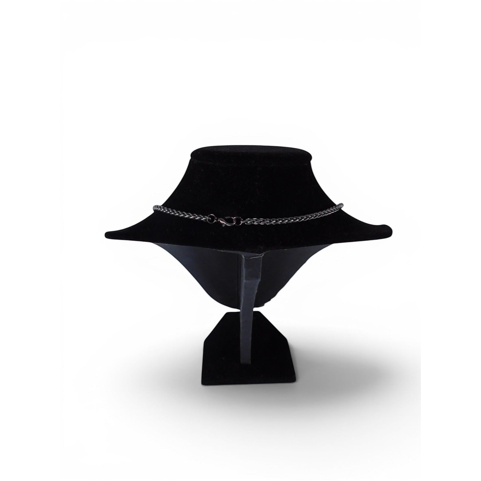 The Witches' Quest black metal chain necklace with lobster clasp shown on a black velvet display stand