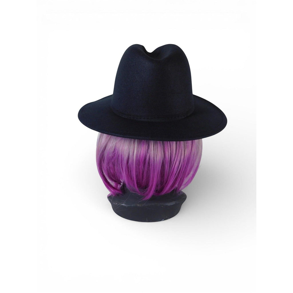 The Witches' Quest black wide brim fedora hat on a mannequin head with purple hair