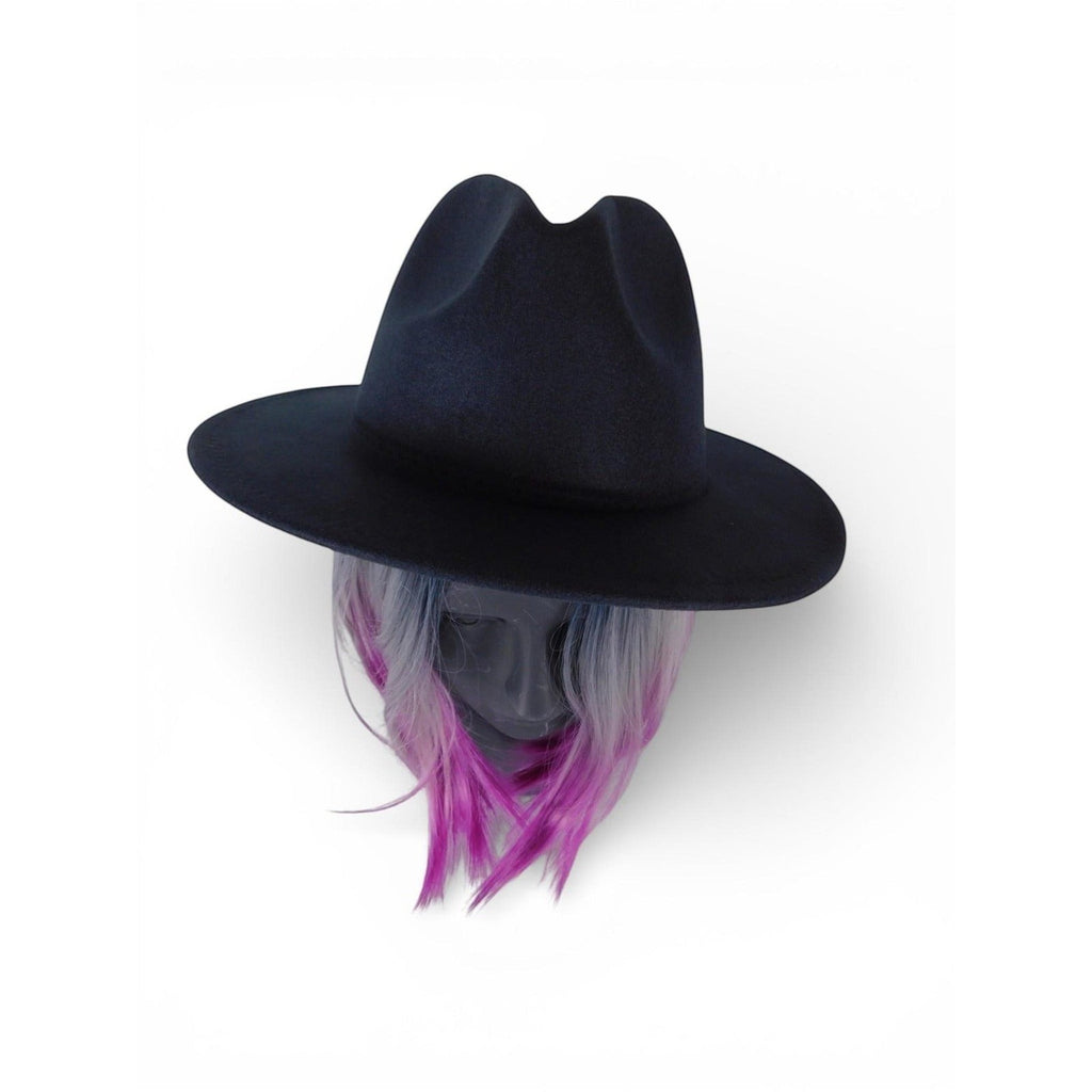 The Witches' Quest black wide brim fedora hat on a mannequin head with pink and grey hair