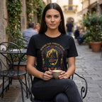 The Witches' Quest black cotton unisex t-shirt featuring a Beware The Forest Witch cottage graphic, worn by a woman.