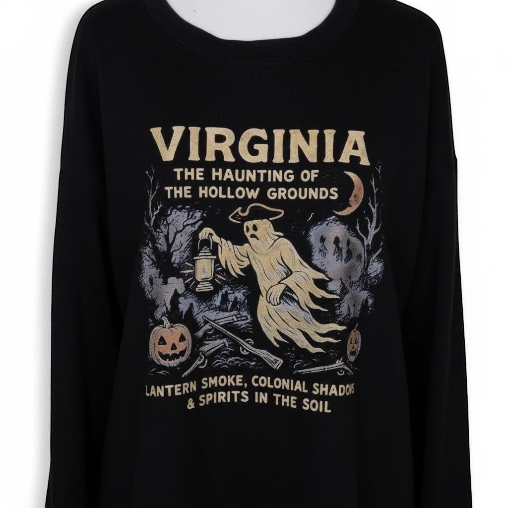 The Witches' Quest black crewneck sweatshirt featuring a vintage-style ghost graphic with jack-o'-lanterns and moon.