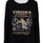 The Witches' Quest black crewneck sweatshirt featuring a vintage-style ghost graphic with jack-o'-lanterns and moon.