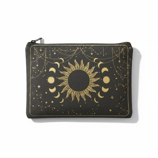 The Witches' Quest black canvas zipper pouch featuring a gold celestial sun and moon design.