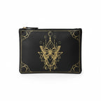The Witches' Quest black canvas zipper pouch featuring an intricate gold moth and celestial geometric design.