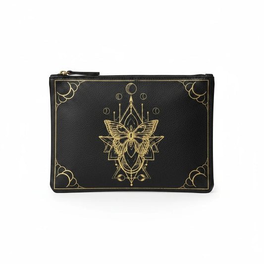 The Witches' Quest black canvas zipper pouch featuring an intricate gold moth and celestial geometric design.