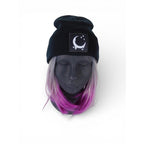 The Witches' Quest black ribbed knit beanie with a crescent moon and stars patch on a mannequin head.