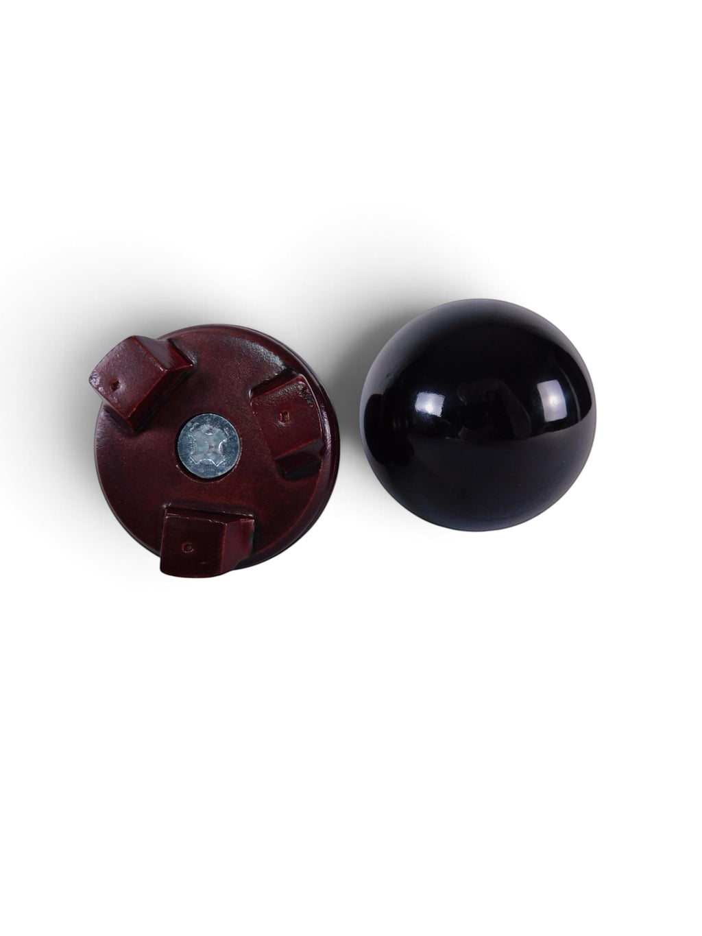 The Witches' Quest polished black obsidian sphere with a dark wooden display stand for altar and scrying use.