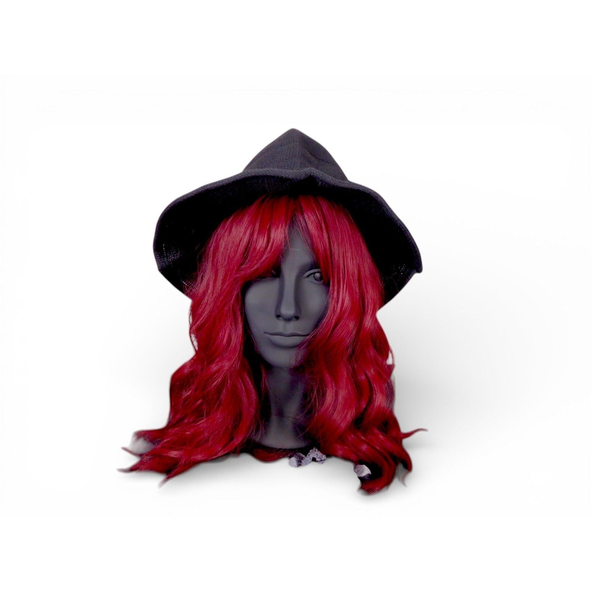 The Witches' Quest classic black pointed witch hat on a mannequin head with long wavy red hair against a white background.