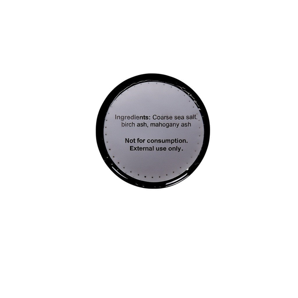 The Witches' Quest black salt jar lid showing ingredients label for ritual protection and external use only
