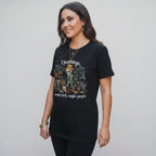 The Witches' Quest black cotton t-shirt featuring a skeleton gardener graphic with the text I bury things