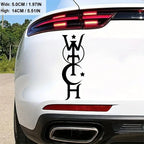 The Witches' Quest black vinyl witch decal applied to the rear bumper of a white car